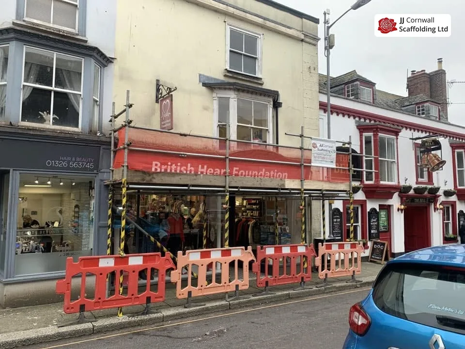 Commercial scaffolding in Cornwall: charity shop frontage wider street view