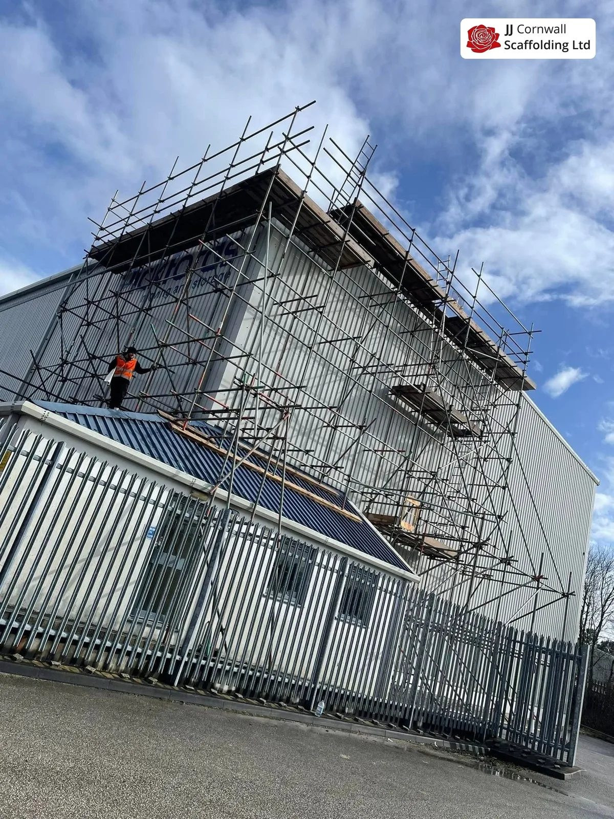 Commercial scaffolding in Cornwall: profile clad industrial unit roof edge scaffold