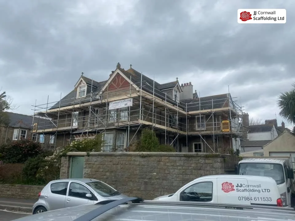 Domestic scaffolding in Cornwall: large granite villa full frontage scaffold with branded van