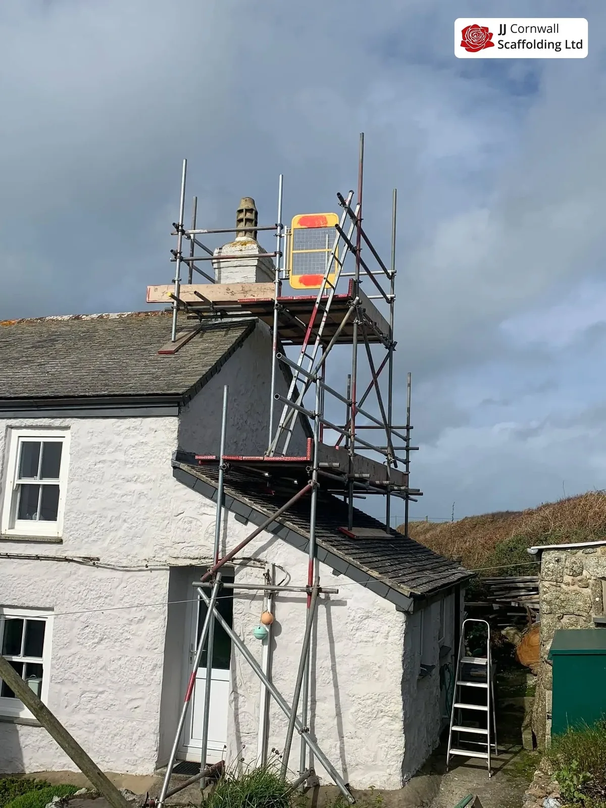 Independent chimney tower built from the ground beside a Cornish house