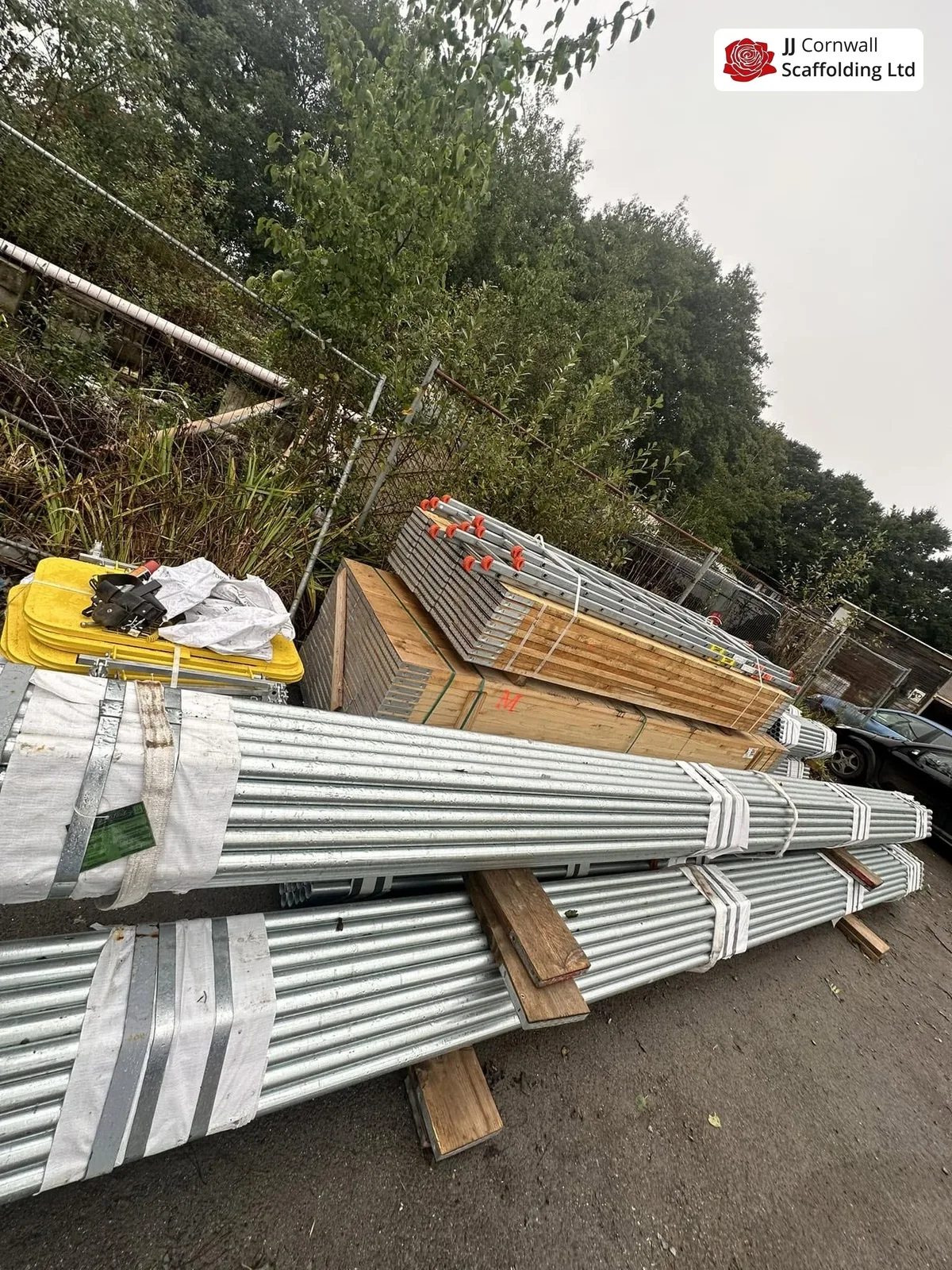 Scaffold hire in Cornwall: new galvanised tube bundles and boards in the yard