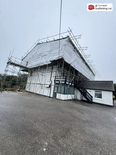 Temporary roof scaffolding sheeted against onshore weather