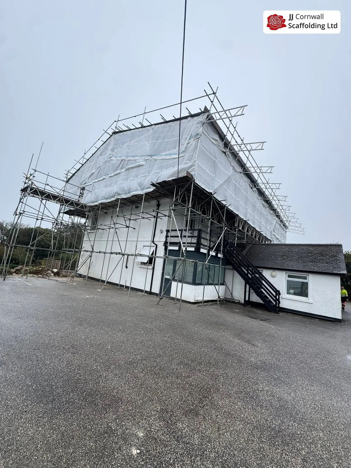 Temporary roof scaffolding sheeted against onshore weather