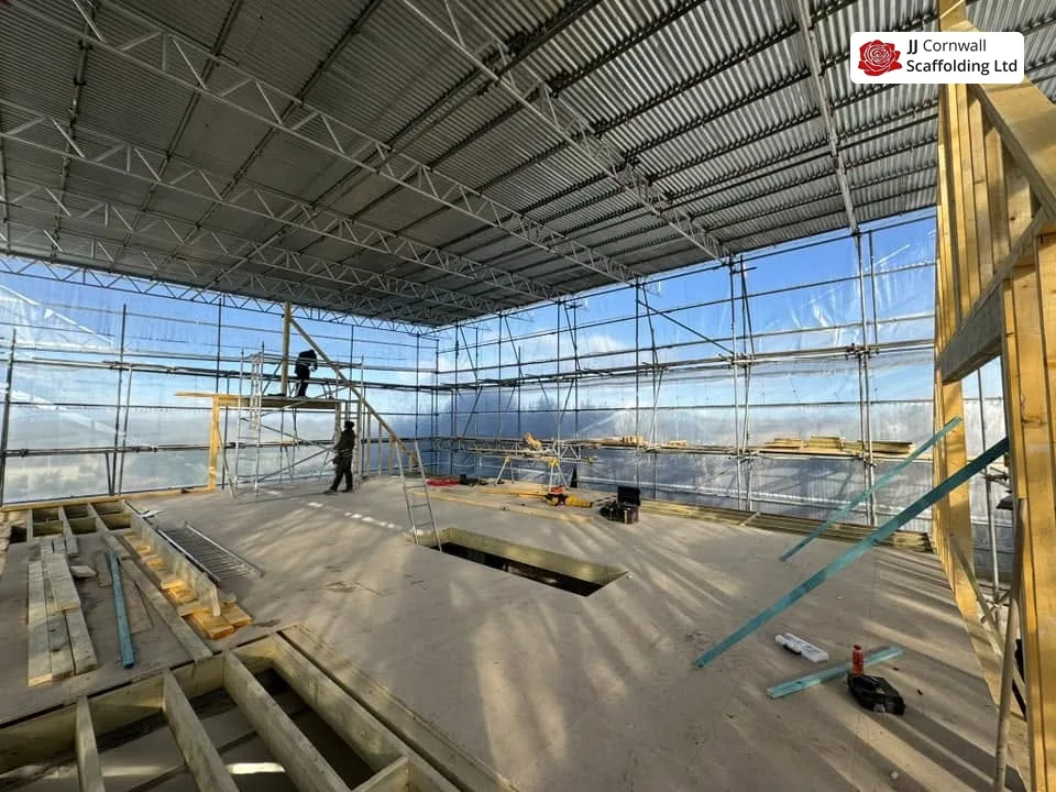Aluminium beams flown across a scaffold before sheeting