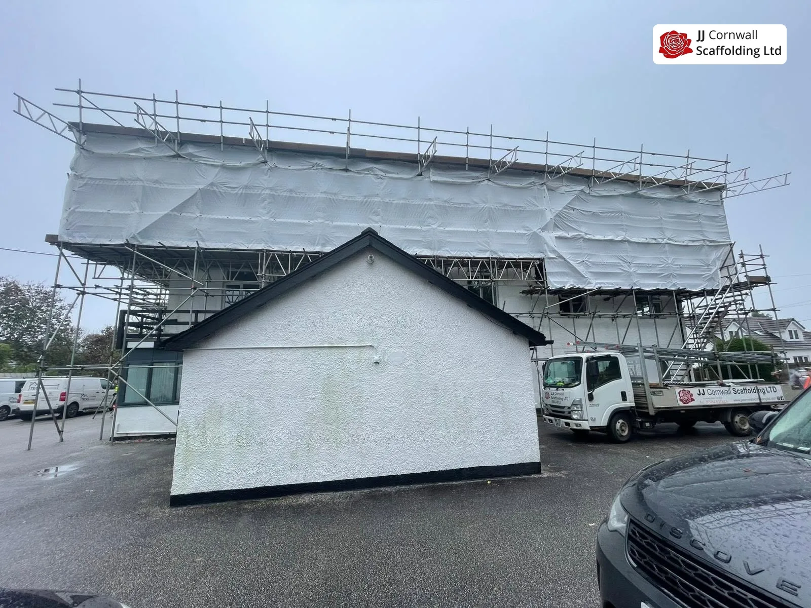 Temporary roof scaffolding on an exposed roof near St Just