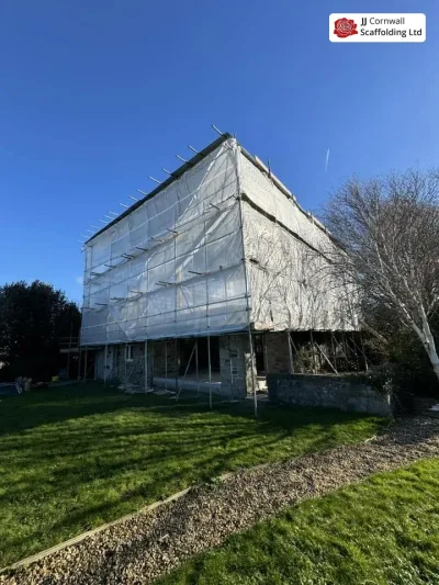 Temporary roof scaffolding on an exposed property near the Lizard