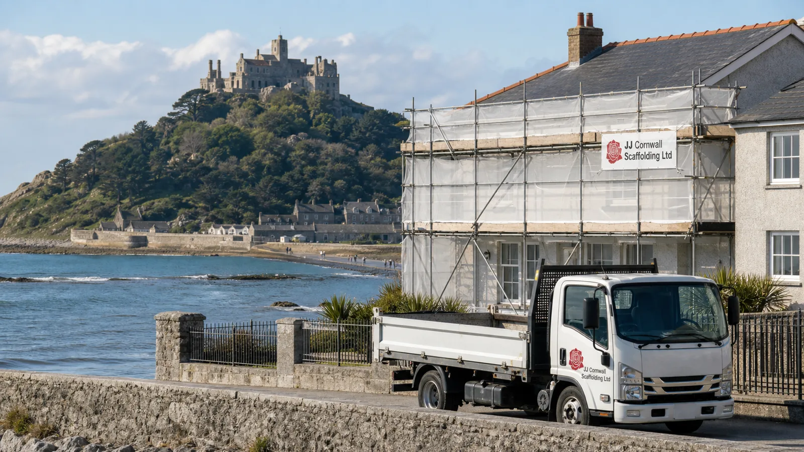 Scaffolding on a seafront property in Marazion with St Michael's Mount behind