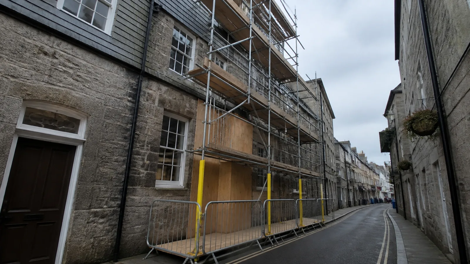 Scaffolding erected on a granite building in Penryn