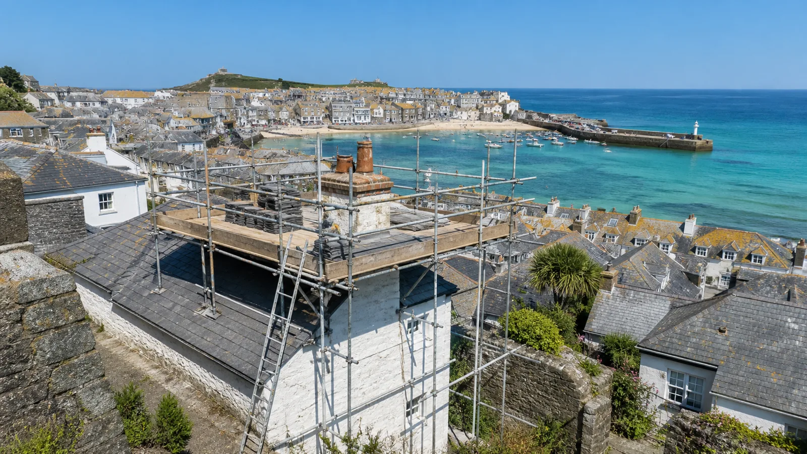 Scaffolding on a granite cottage in St Ives